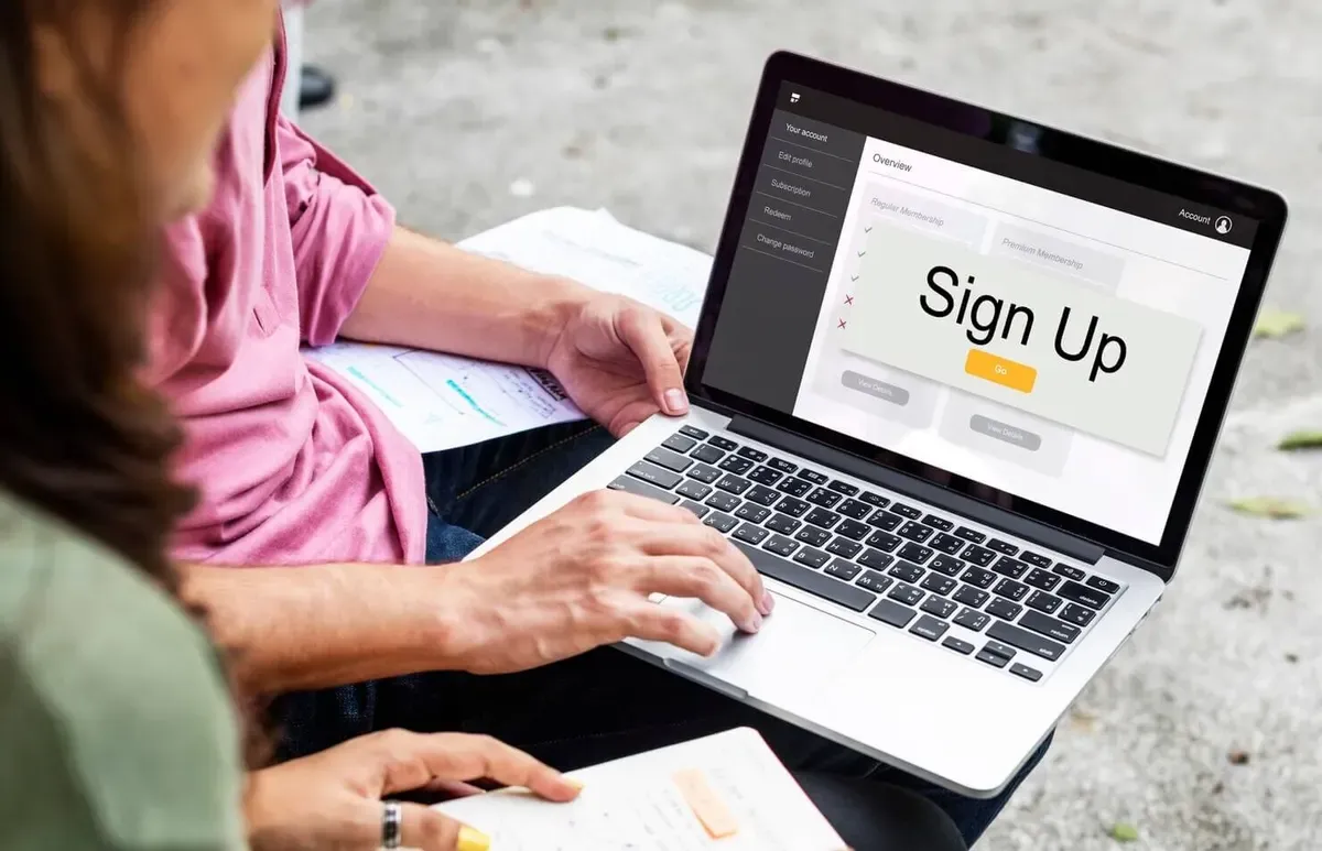 Pop-up on laptop. People deciding on auditing website pop ups and ctas