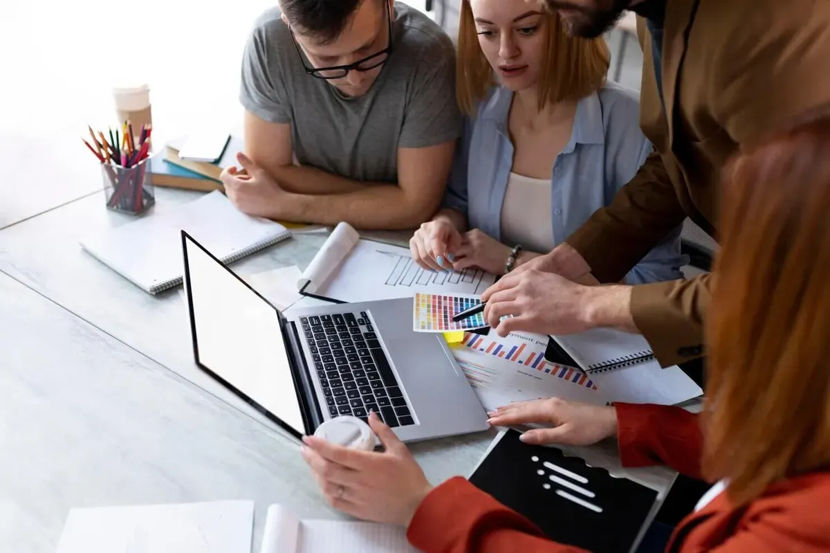 People brainstorming in a work meeting on how to use WordPress for tech startups