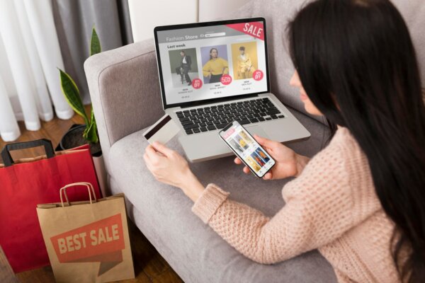 Woman checking product optimization on Woocommerce store on various devices
