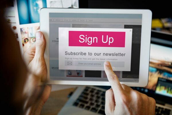 Women clicking Calls-to-Action to sign up for newsletter