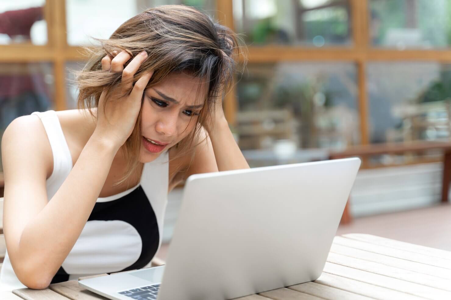 Working woman frustrating with issues associated with lazy loading in WordPress