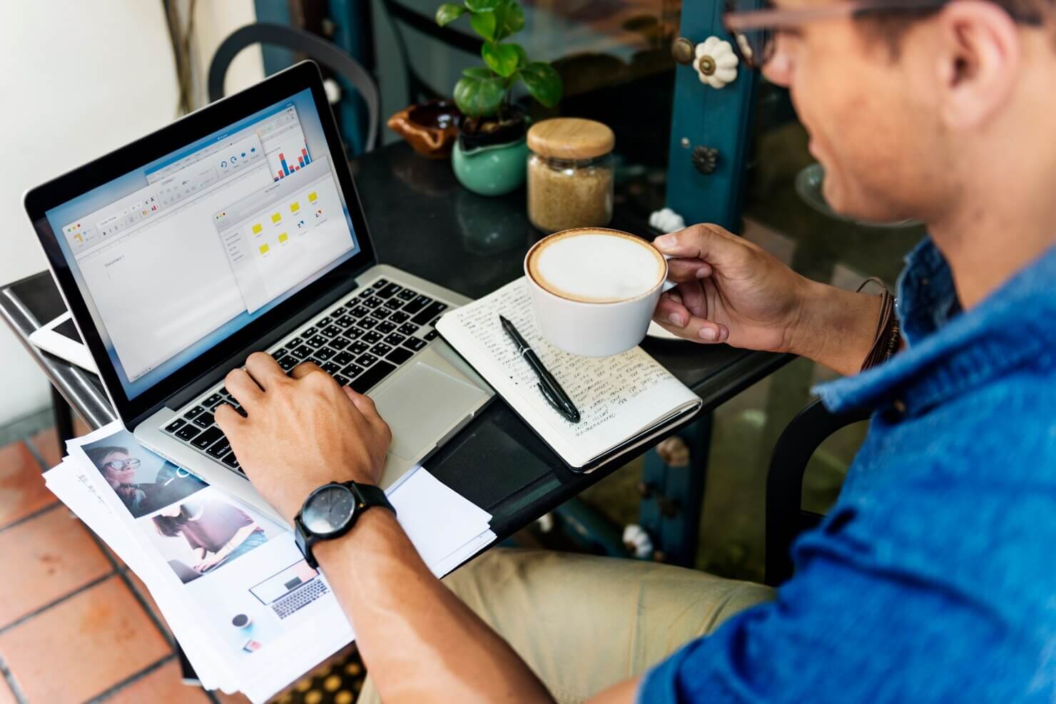 Man Working Coffee Shop, exploring various WordPress themes and plugins