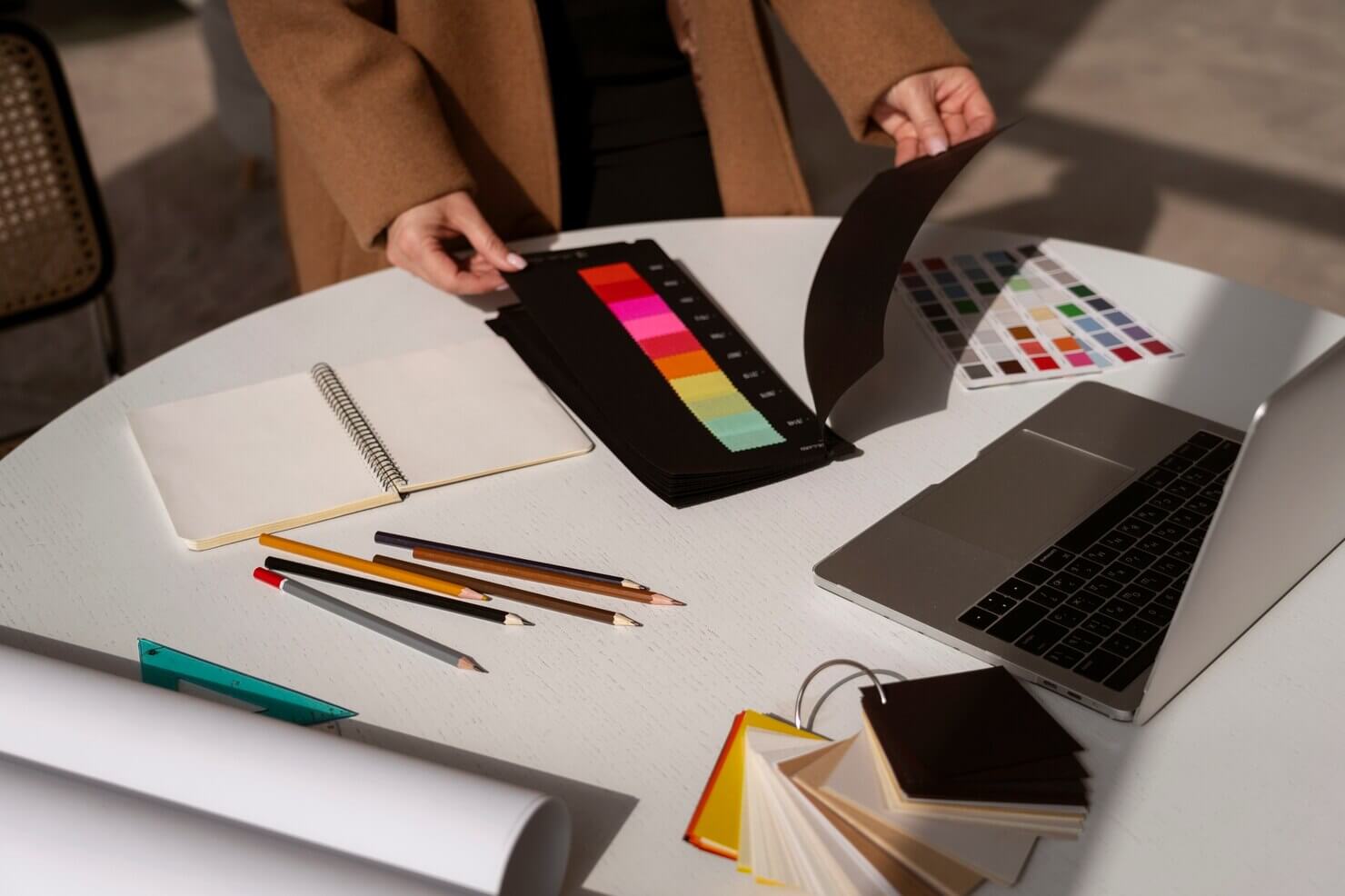 Woman working as designer to create brand identity for company