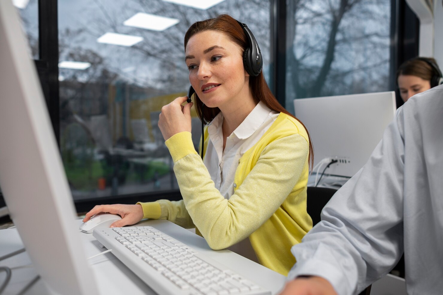 Woman receiving calls during WordPress website support services