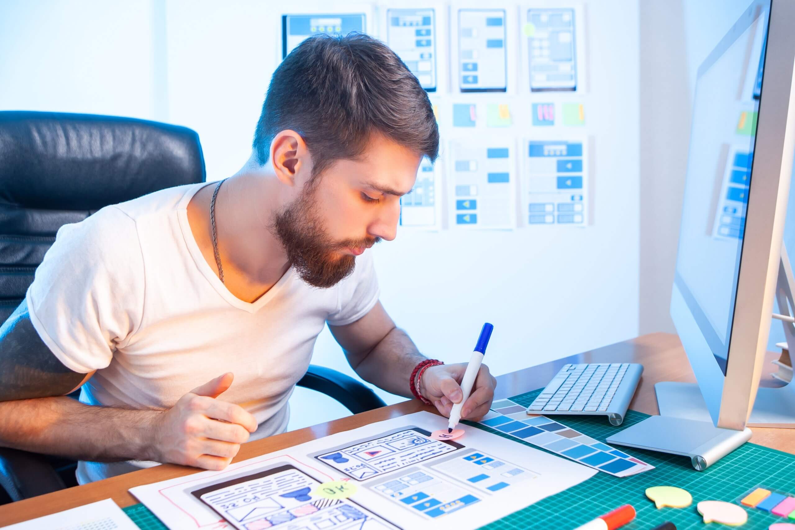 Designer working on a mobile responsive design for WordPress site