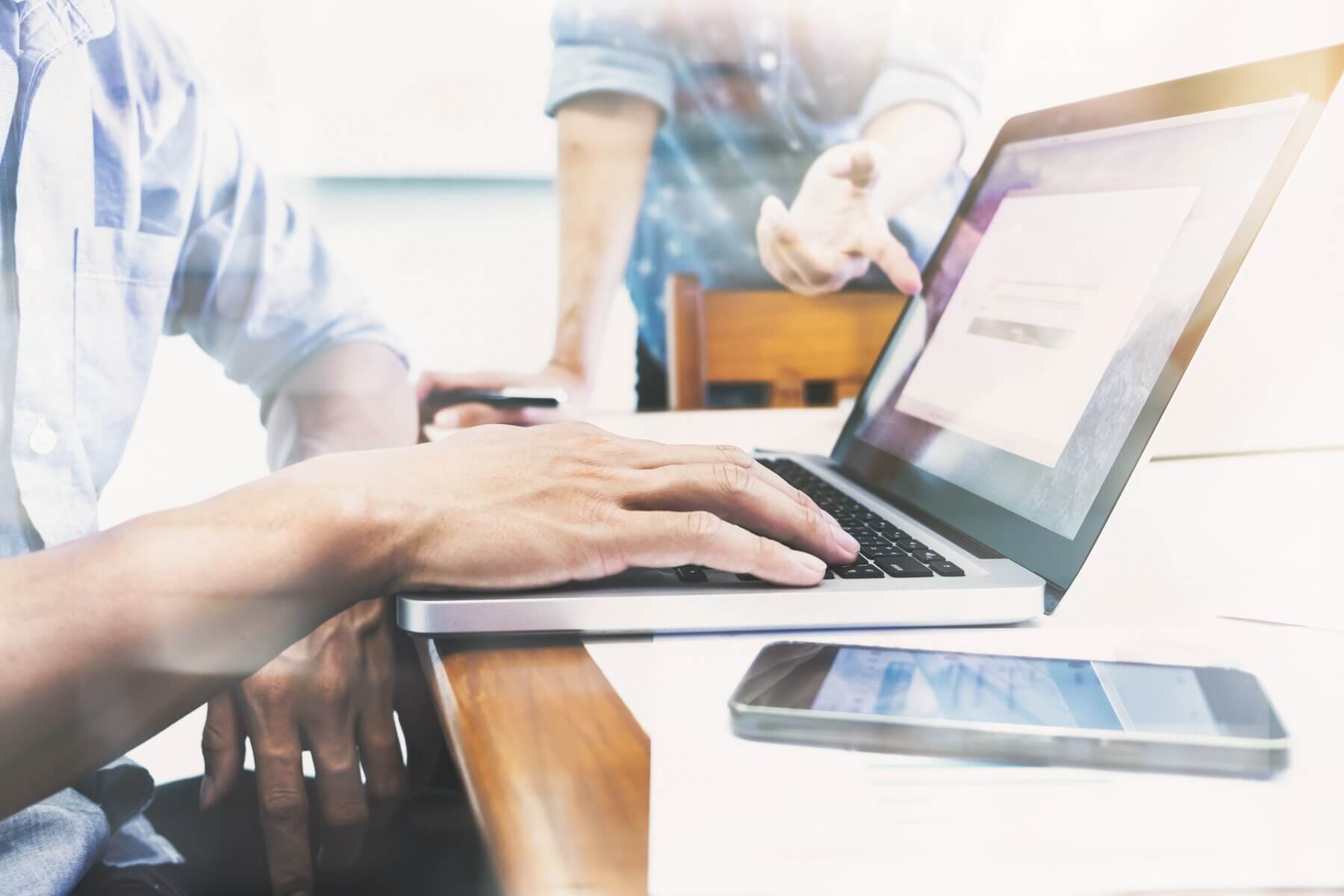 Business teamwork meeting to enhance conversions on website