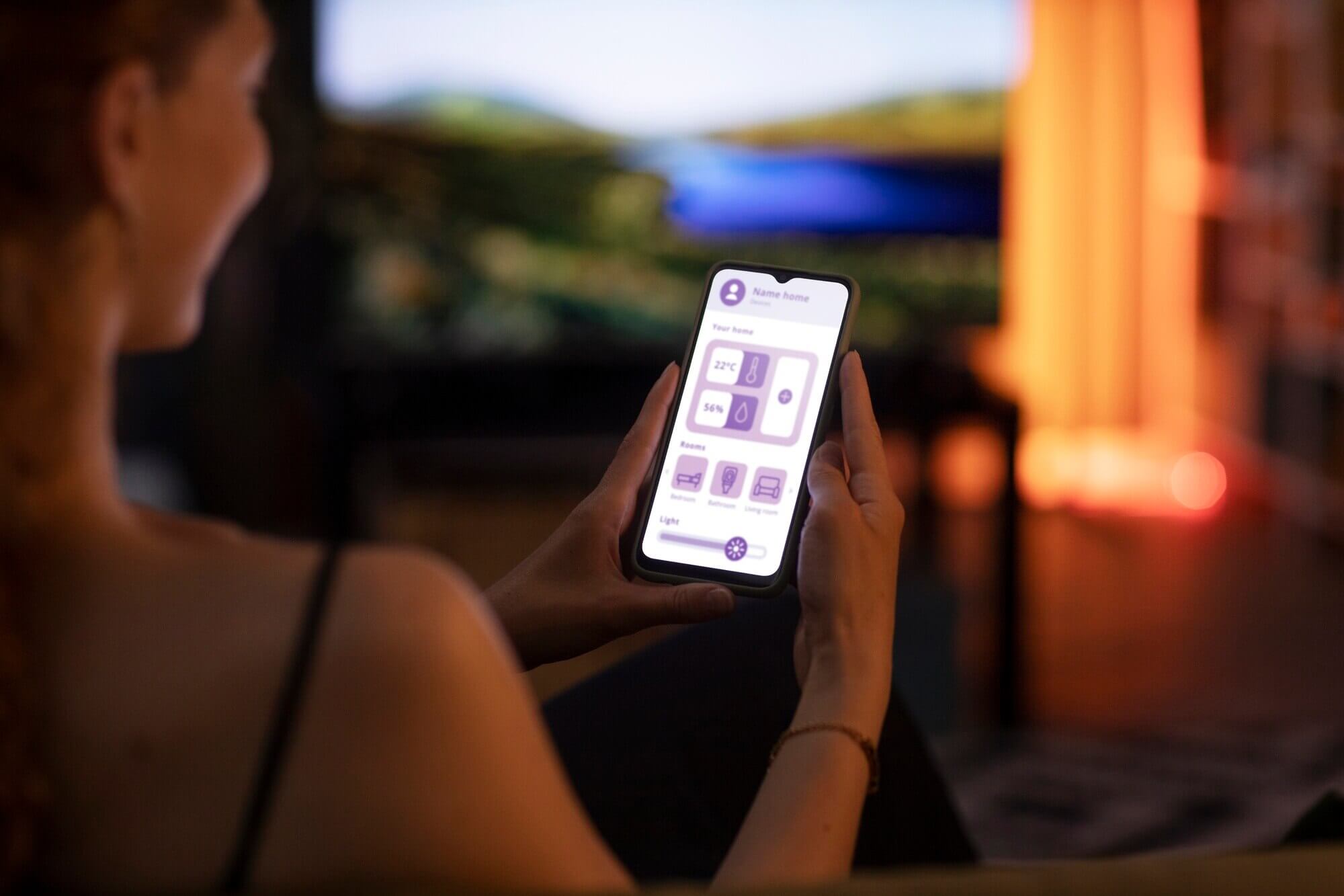 Hands holding smartphone to use mobile-friendly site