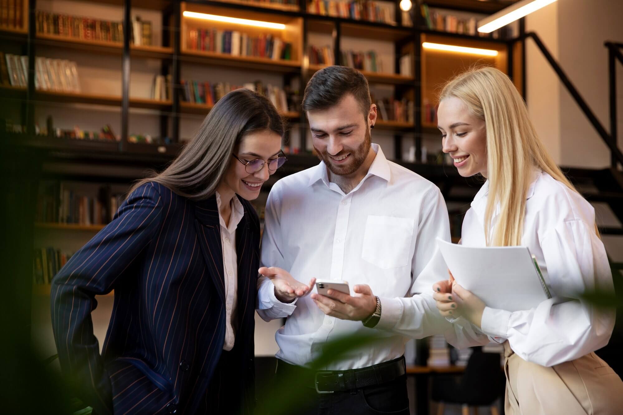 Close up on young business people sharing deep business knowledge - insource or outsource WordPress support