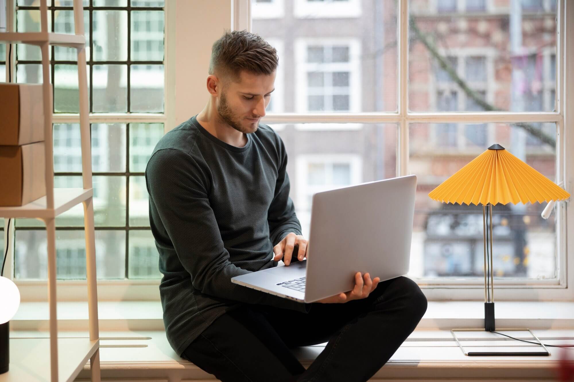 Digital nomad working remotely designing WordPress site for conversion rates