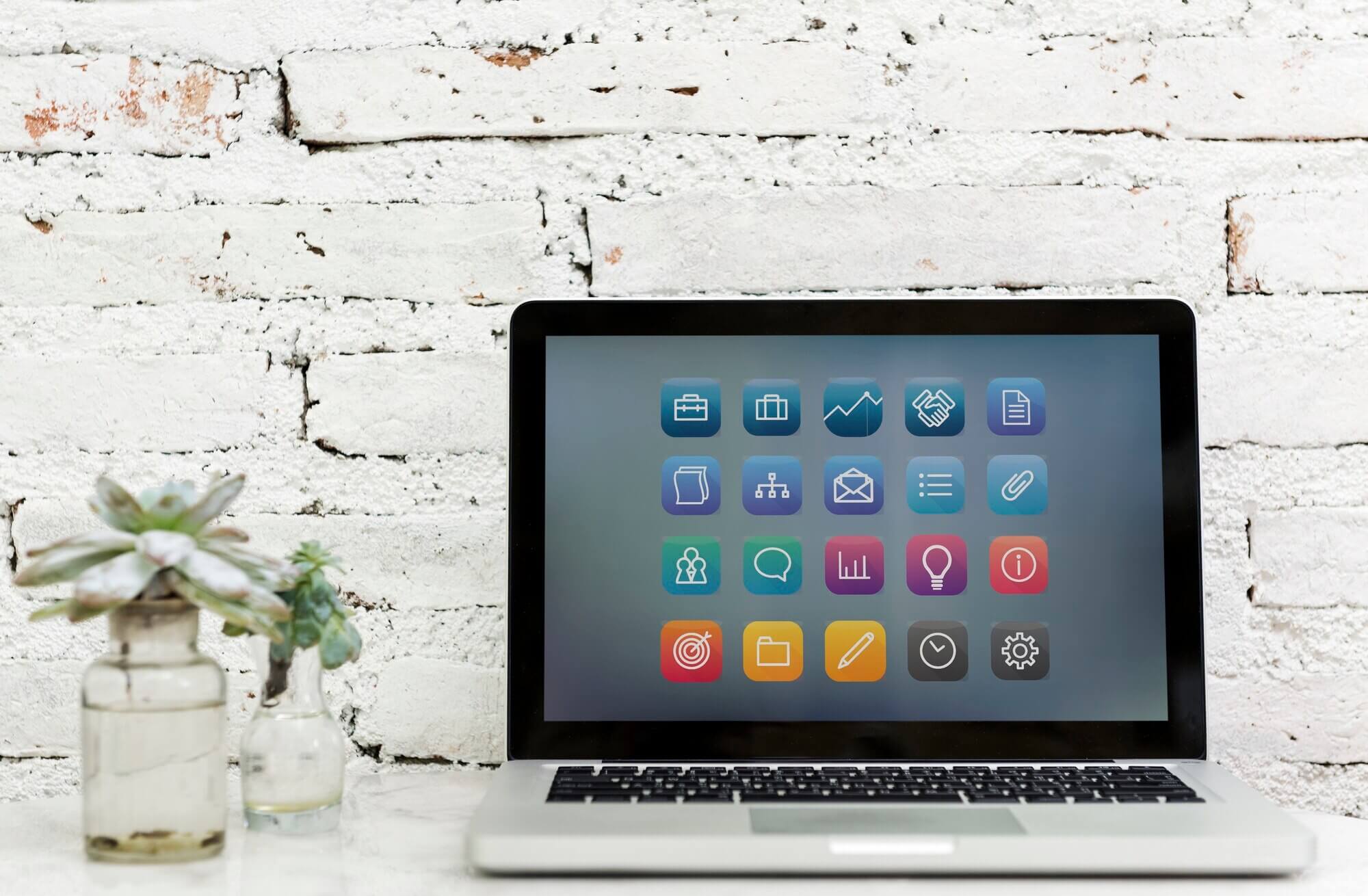 Design space on computer laptop screen with plugins and apps on the screen