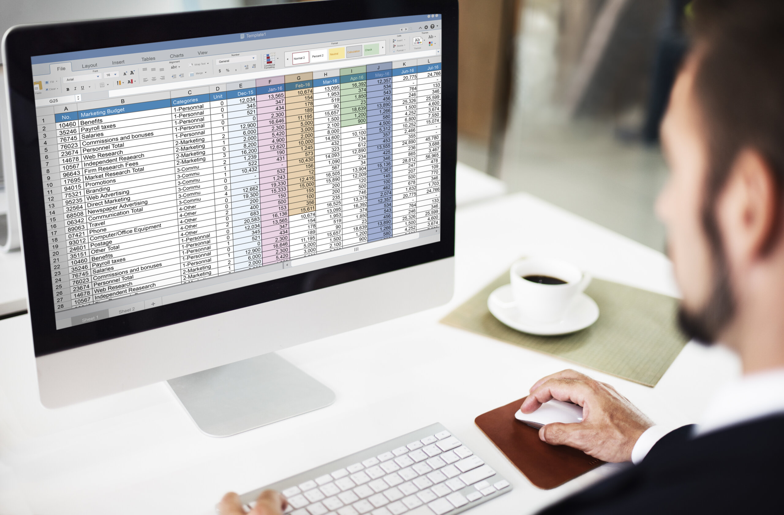 Man looking at post migration audit checklist